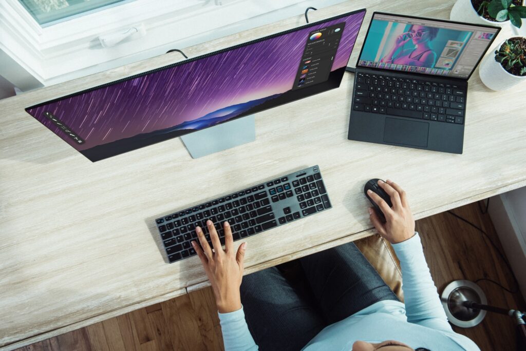 an employee at her computer using the companys internal database