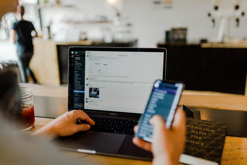 an employee using asynchronous communication at work 1