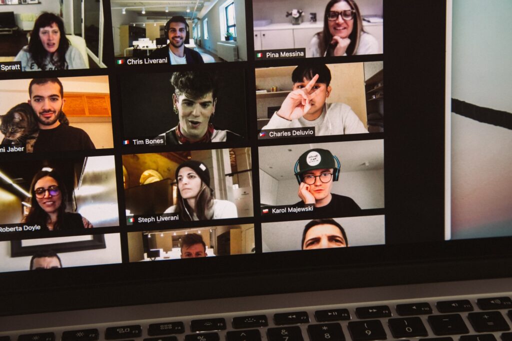 colleagues on a zoom meeting playing a virtual scavenger hunt team building together with their remote teammates