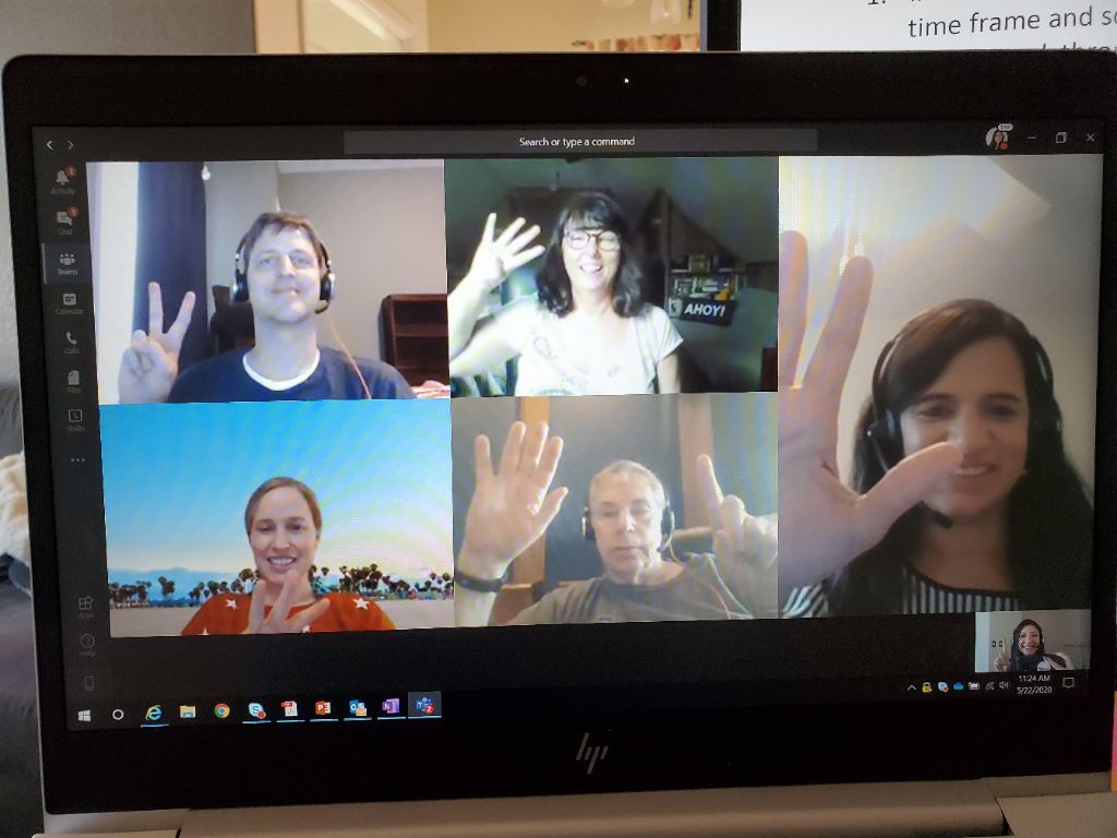 team members doing a fun virtual clue murder mystery