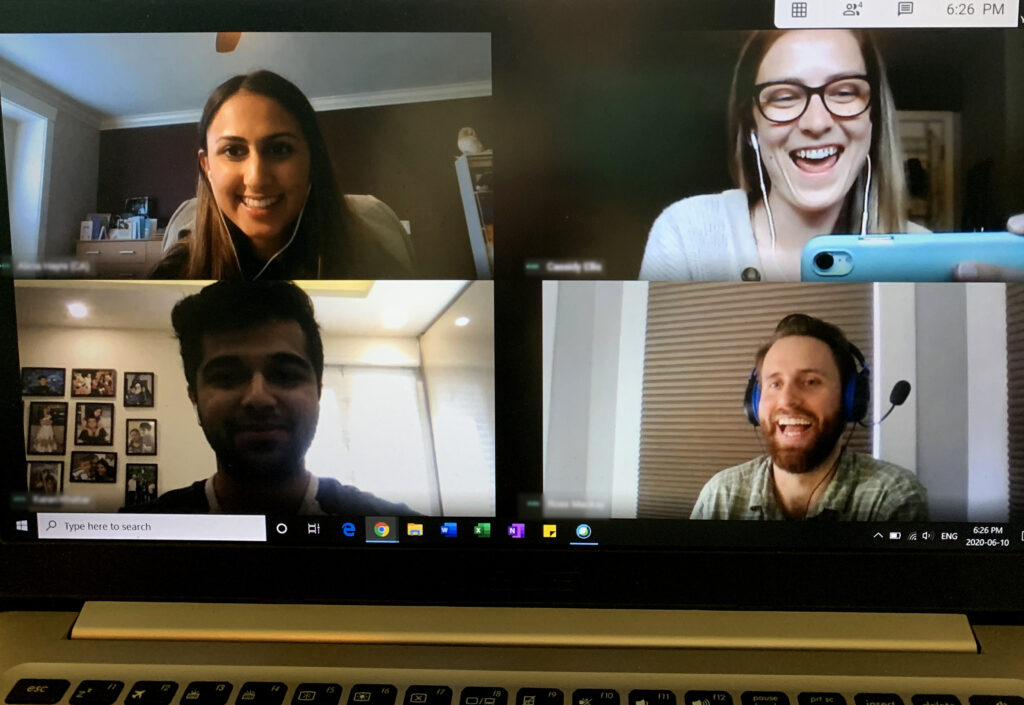 four colleagues taking part in a virtual group skills training program