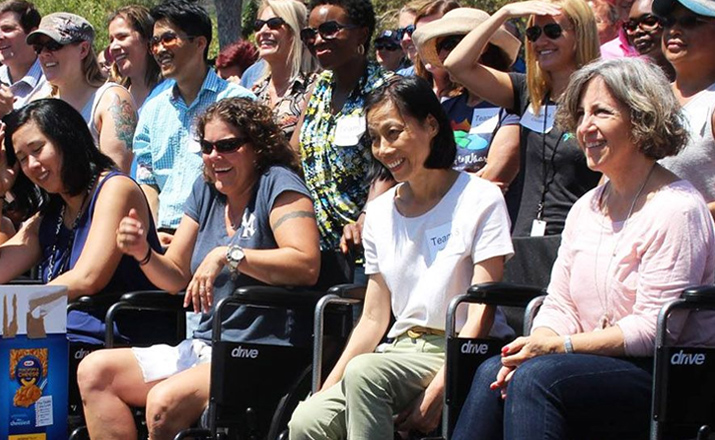 wheelchairs for charity team building hero